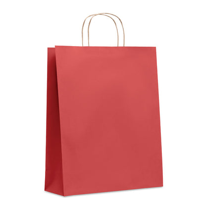 Bolsa roja de papel con fuelle y asas retorcidas