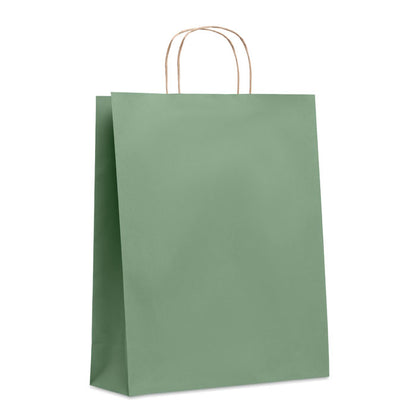Bolsa verde de papel con fuelle y asas retorcidas