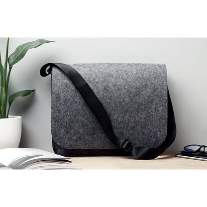 Bolsa para laptop de 15'' en gris con cierre de velcro y bandolera negra ajustable.