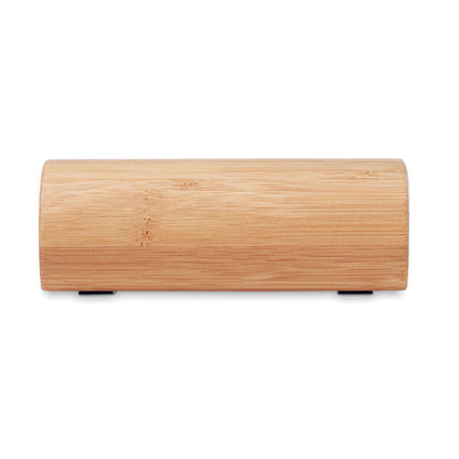 Vista frontal de altavoz de madera cilíndrico