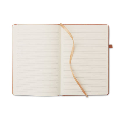 Libreta abierta, vista hojas con cinta marcapáginas