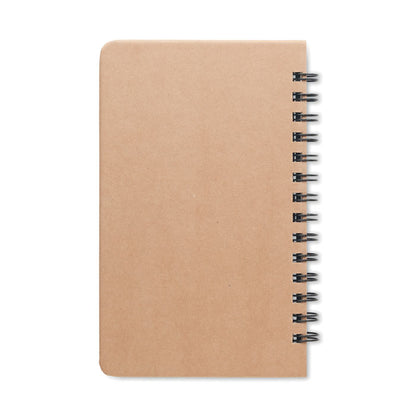 Vista trasera de cuaderno de papel eco