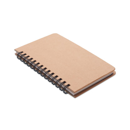 Vista frontal de libreta con espiral de cartón
