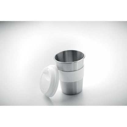 Vista superior de vaso de acero inoxidable abierto con la tapa de silicona blanca al lado