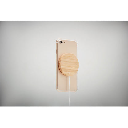 Cargador redondo de madera acoplado a teléfono móvil con ima´n