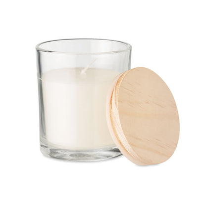 Vela de vainilla de vidrio con tapa de madera a un lado