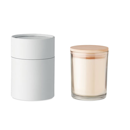 Vela de vidrio olor vainilla, tapa de bambú caja cilíndrica al lado