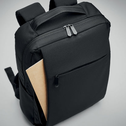 Vista superior de mochila con cierre con dos cremalleras, bolsillo exterior con cremallera y bolsillo con documentos