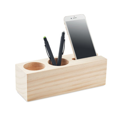 Soporte de madera con bolígrafos y teléfono móvil