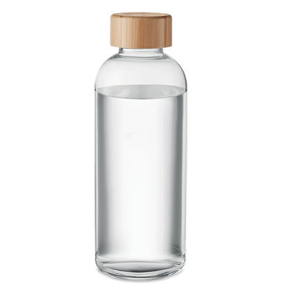 Botella con agua de vidrio y tapa de madera