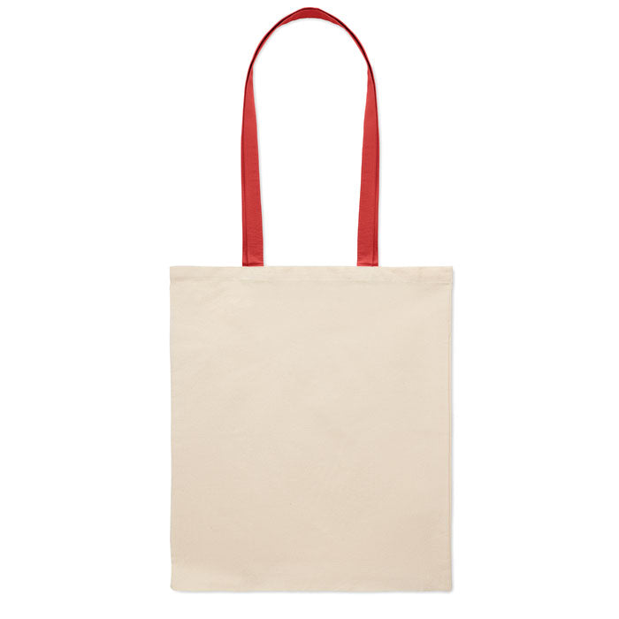 Vista trasera de la bolsa ZEVRA con asas largas rojas. Diseño versátil y personalizable para campañas ecológicas.