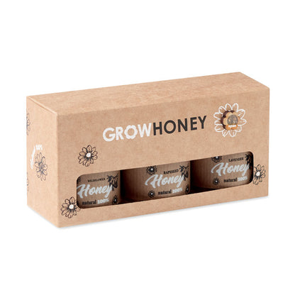 3 tarros de miel de 3 sabores en caja de carton con ventana