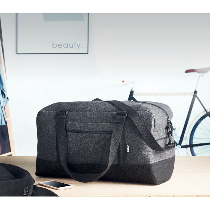 INDICO BAG - Bolsa fin de semana de fieltro - Regalos Corporativos Personalizados · Clap Comunicacion