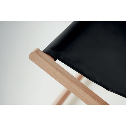 Detalle tejido silla de madera y tela negra