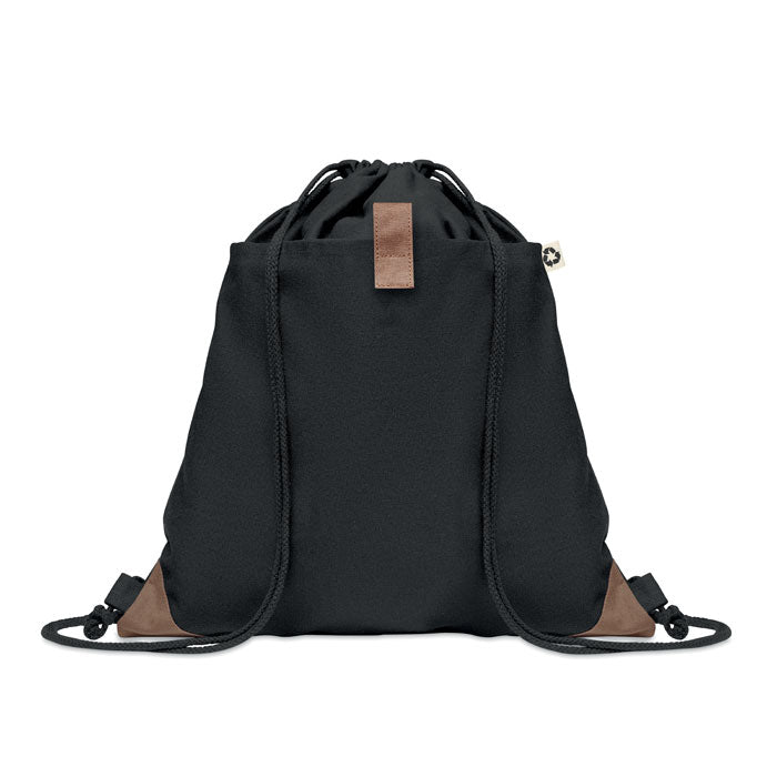 PANDA BAG - Bolsa cuerdas algodón reciclado personalizable en color negro con detalles marrones, ideal como mochila ecológica para compras o playa.