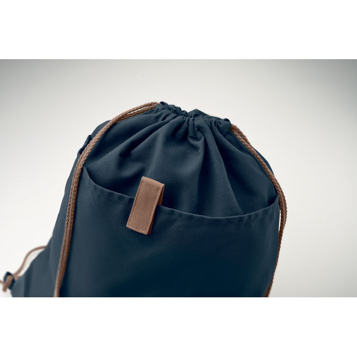 Detalle del cierre de la PANDA BAG azul marino, muestra la calidad del algodón reciclado de 220 gr/m² y diseño ecológico.