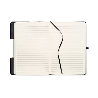 Libreta abierta. Hojas color crema con rayas