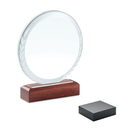 Placa redonda de cristal sobre peana de madera en caja negra de regalo