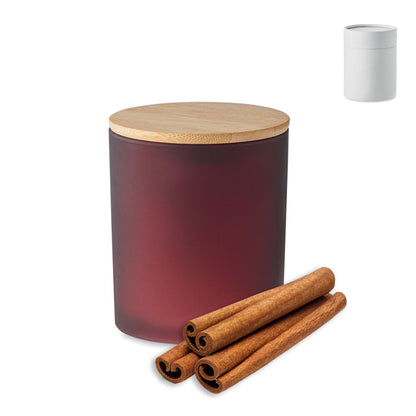 Vela de canela en bote con caja blanca cilíndrica