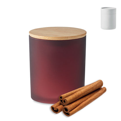 Vela burdeos en tarro de vidrio con canela y caja