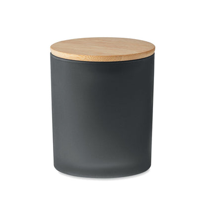 Vela en bote negro con tapa de madera