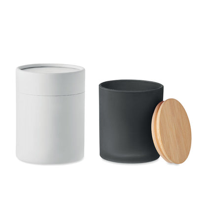 Vela negra con tapa de bambú y caja cilíndrica