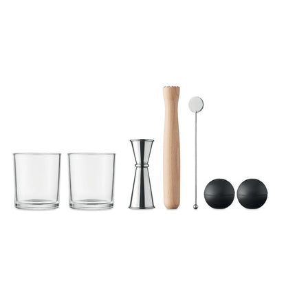 Set de coctel de 7 piezas: dos vasos, dosificador de acero inoxidable de doble uso (25 y 50 ml), mortero de madera, agitador de bebidas de acero inoxidable y dos moldes de silicona para hielo.