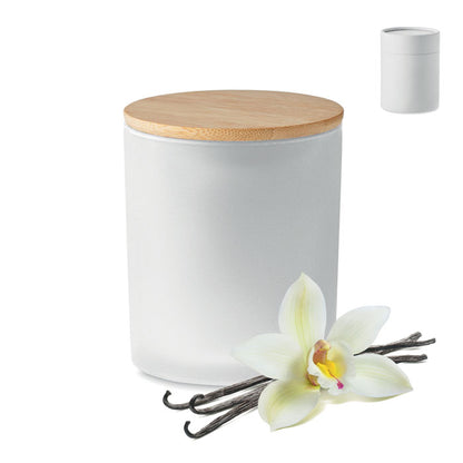 Vela en bote de cristal blanca con flores