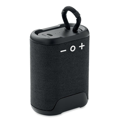Altavoz inalámbrico negro con btones de volumen y encendido blancos en parte frontal y con asa de transporte