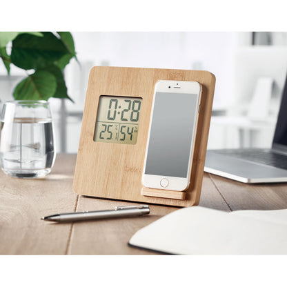 Mesa de madera sobre mesa con soporte de móvil