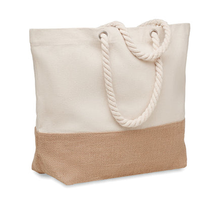 Bolsa de playa de algodón color natural con base de yute y asas trenzadas de cordón grueso