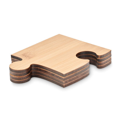 posavasos en forma de pieza de puzzle de madera