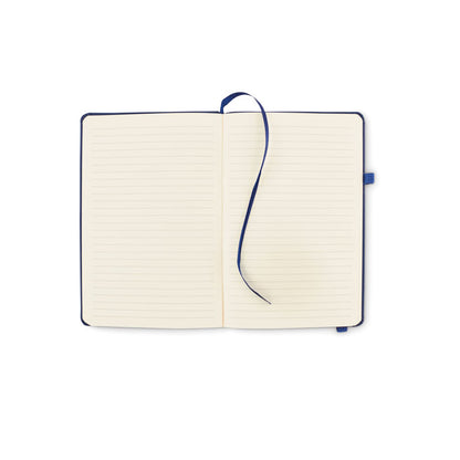 Hojas de libreta azul con marca paginas