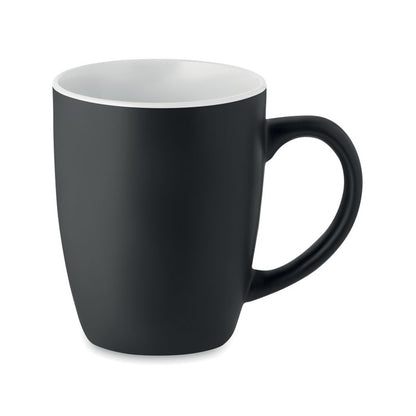 Taza de cerámica negra mate en el exterior y blanco brillante en en interior