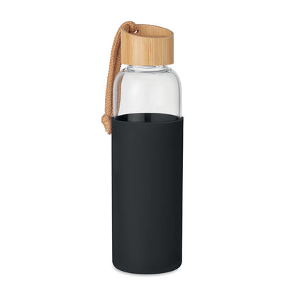 Botella de vidrio con funda negra y tapón de bambú
