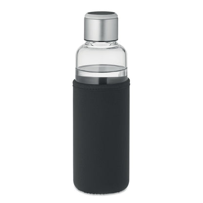 Botella de vidrio con funda negra de neopreno