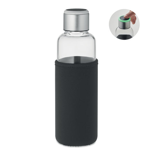 Botella de vidrio con sensor y funda de neopreno negra, con tapa metálica y función de recordatorio de hidratación.