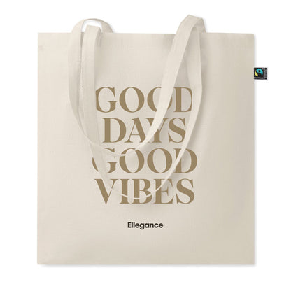 Totebag de algodón personalizada con una frase a un tamaño grande y un logotipo