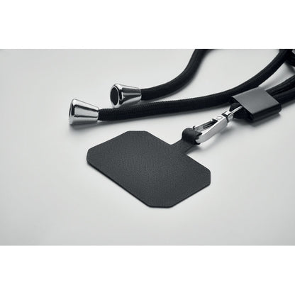 Detalle de pieza para meter en la funda del móvil y poder sujetarlo a un lanyard