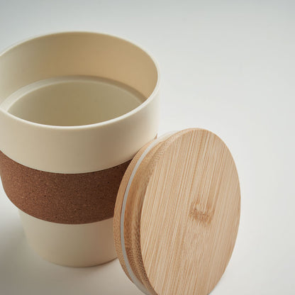 Vaso beige de plástico con faja de corcho y tapadera hermética de madera
