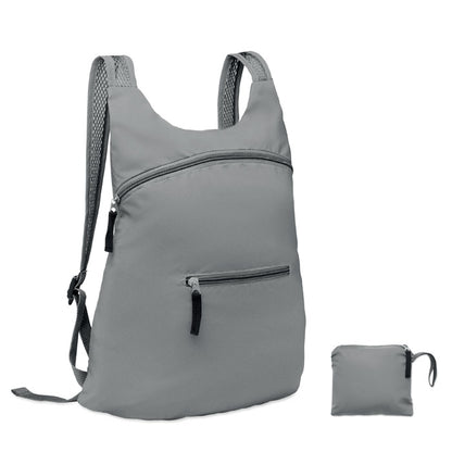 Mochila gris reflectante plegable en su propio bolsillo frontal con cremallera
