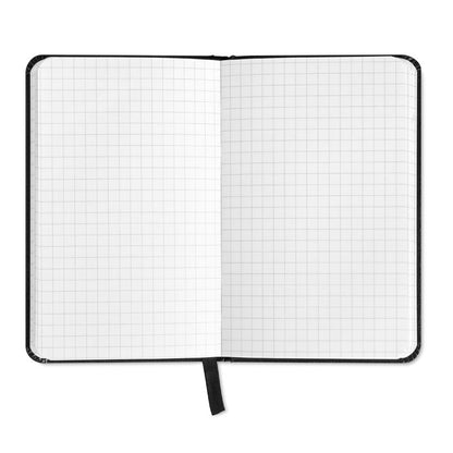 Bloc abierto mostrando hojas blancas de libreta