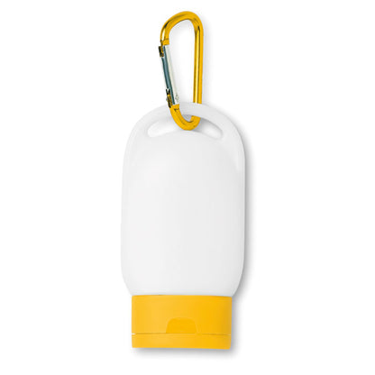 Pequeño bote de protector solar con tapa y mosquetón color amarillo