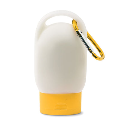 Pequeño bote de protector solar con tapa y mosquetón color amarillo