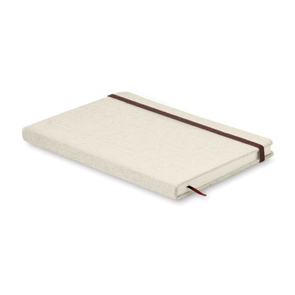 Vista lateral de libreta con cubiertas de canva y cierre marrón