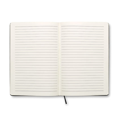 Vista de hojas rayadas de libreta con marcapáginas