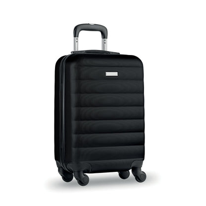 Trolley rígido de viaje color negro con 4 ruedas y con pequeña chapa metálica para personalizar