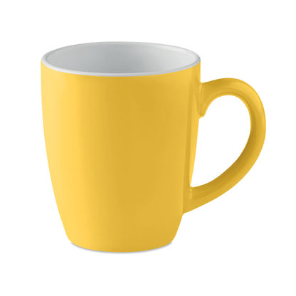 Taza de cerámica amarilla con interior blanco