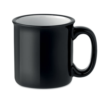 Taza de cerámica negra estilo vintage con interior blanco