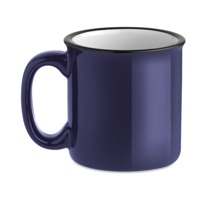 Taza vintage de cerámica azul